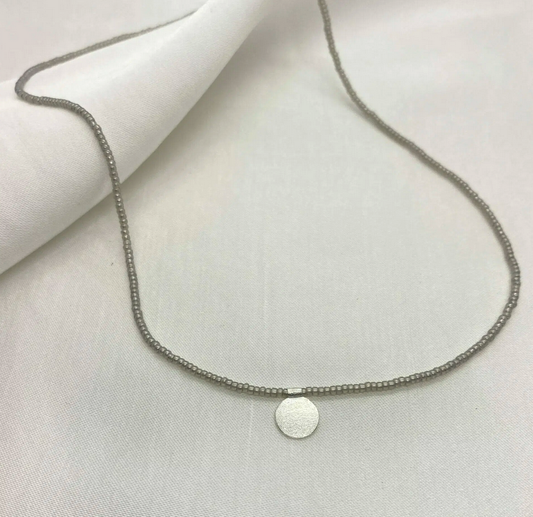 Short beaded necklace with SILVER disc