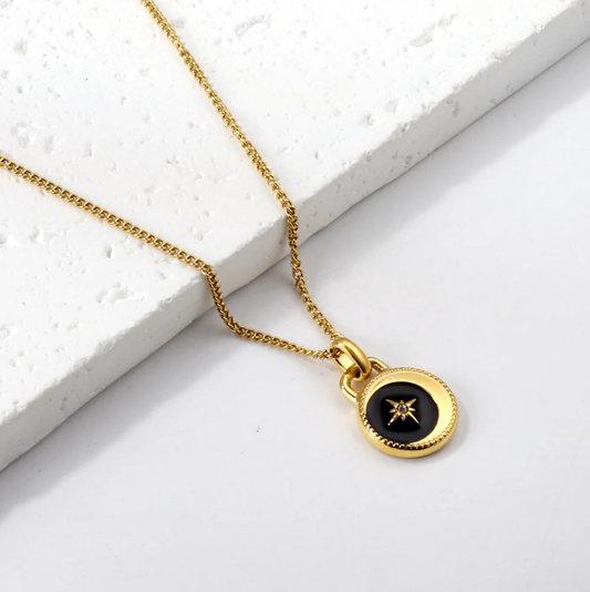 NP7 Gold necklace with black star pendant